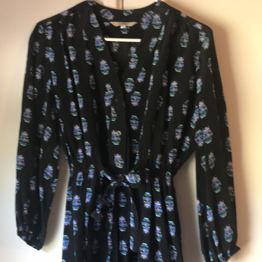 Tucker dress with Russian doll pattern